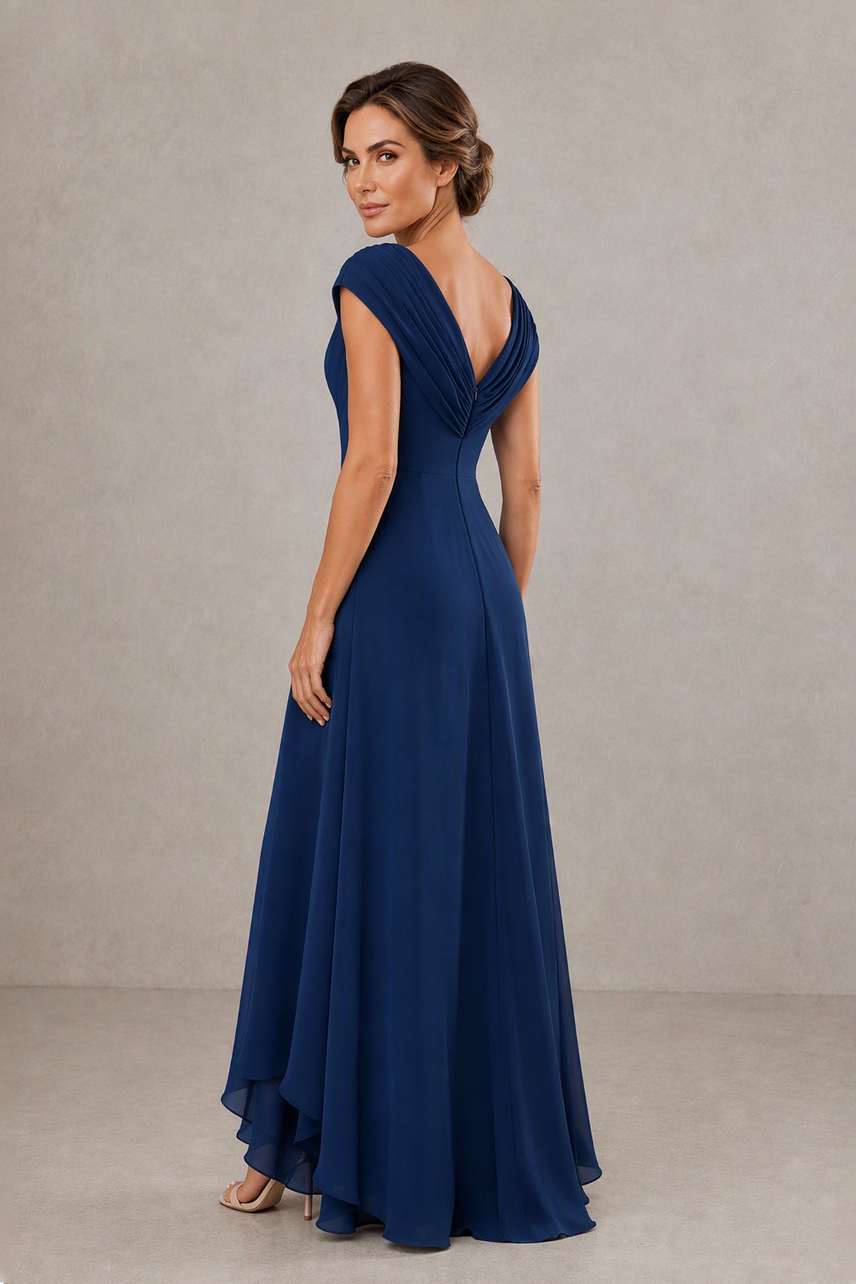 BOLODOO navy blue open-back formal dress with V-neck and flowing high-low skirt, back view