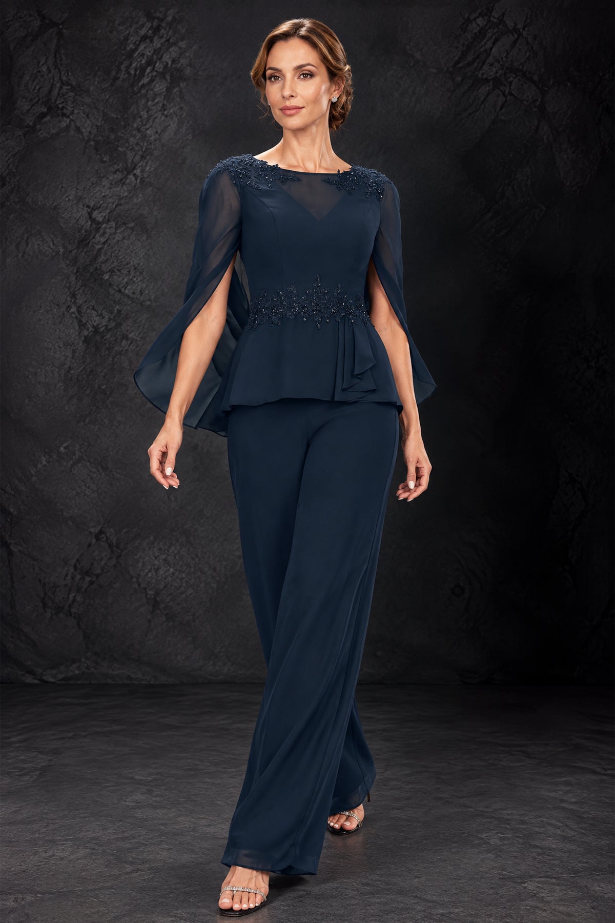 BOLODOO navy blue mother of the bride pantsuit showing draped split cape sleeves and flowing trousers