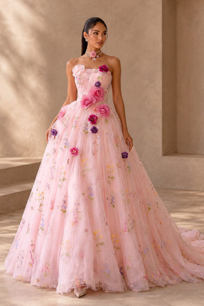 Full-length front view of BOLODOO blush pink corset-style ball gown with multicolored floral details