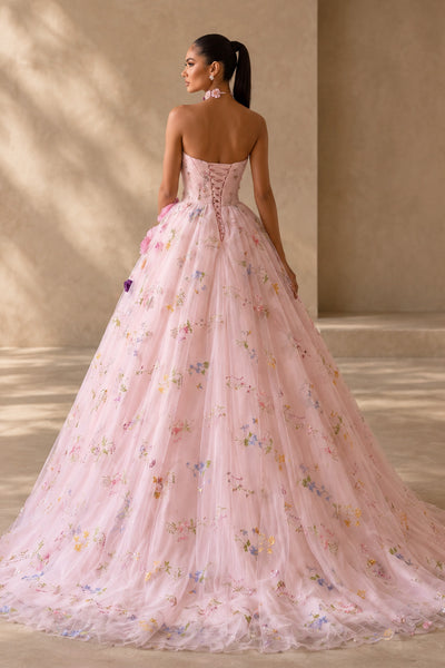 Back view of BOLODOO pink strapless floral ball gown showing lace-up bodice and sweeping train