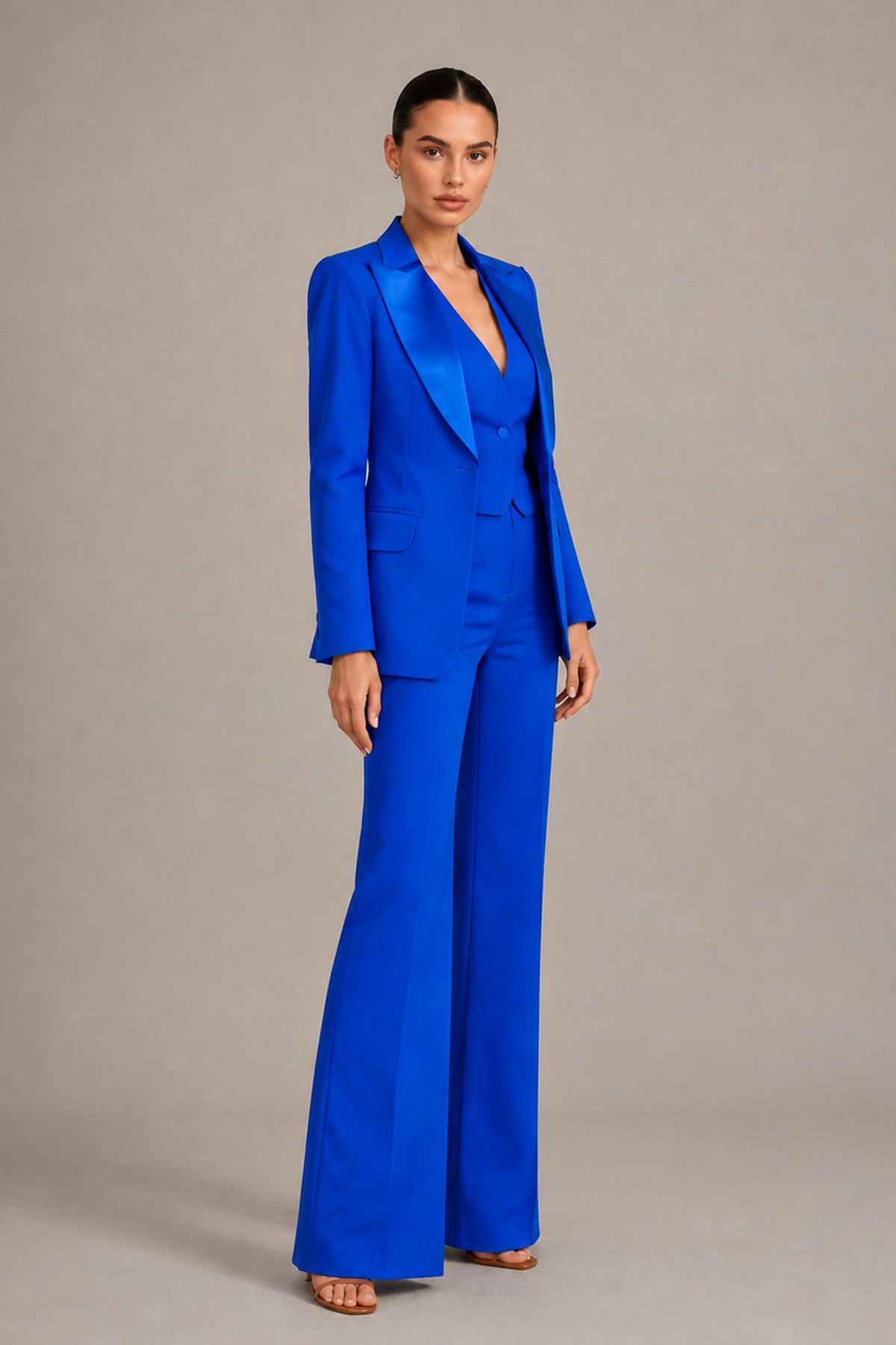 BOLODOO royal blue formal pantsuit angled view showing satin-finish lapels and matching waistcoat