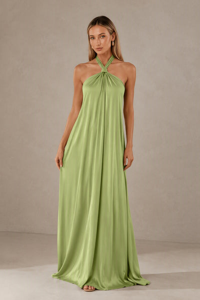 Side view of BOLODOO sage green sleeveless halter satin maxi dress with a fluid floor-length silhouette