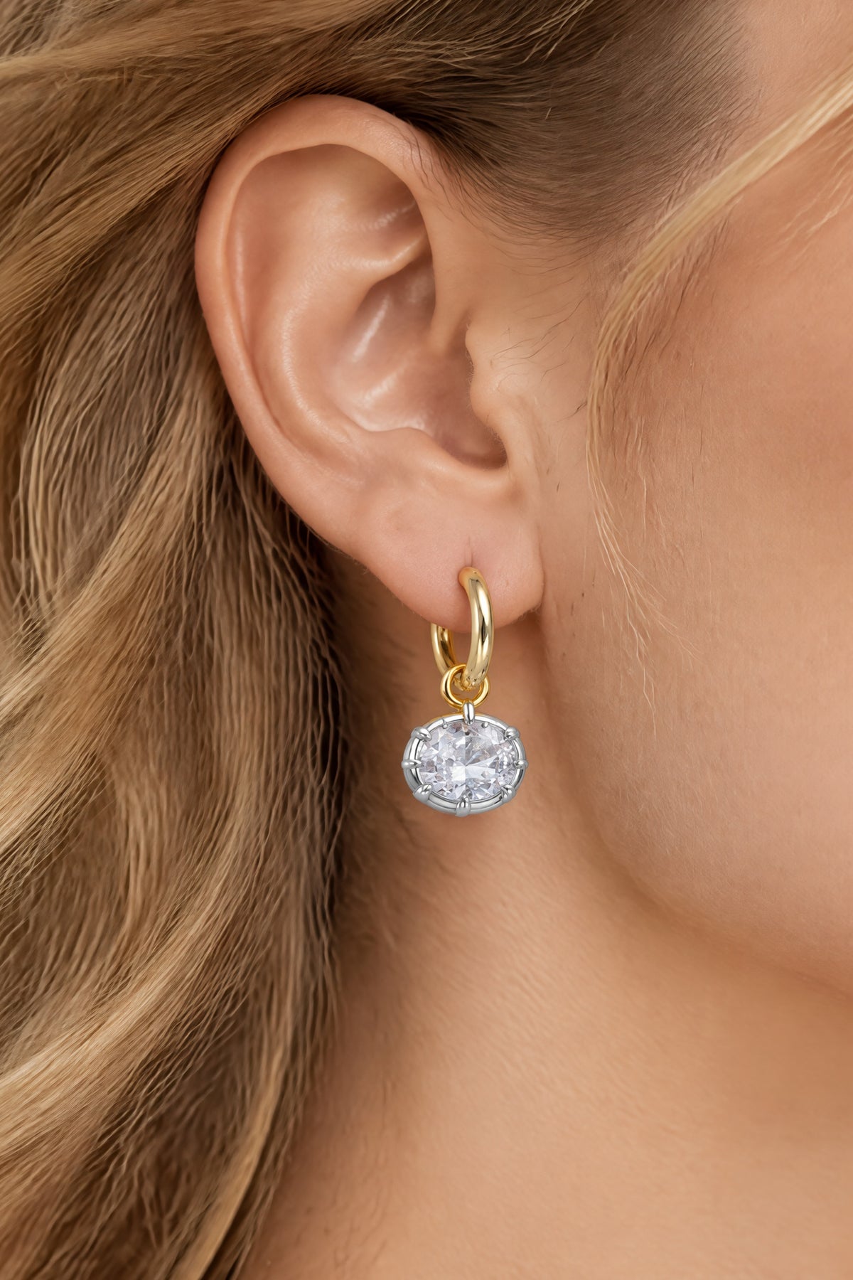 BOLODOO QQ065 gold-tone hoop and clear round drop earring worn on the ear