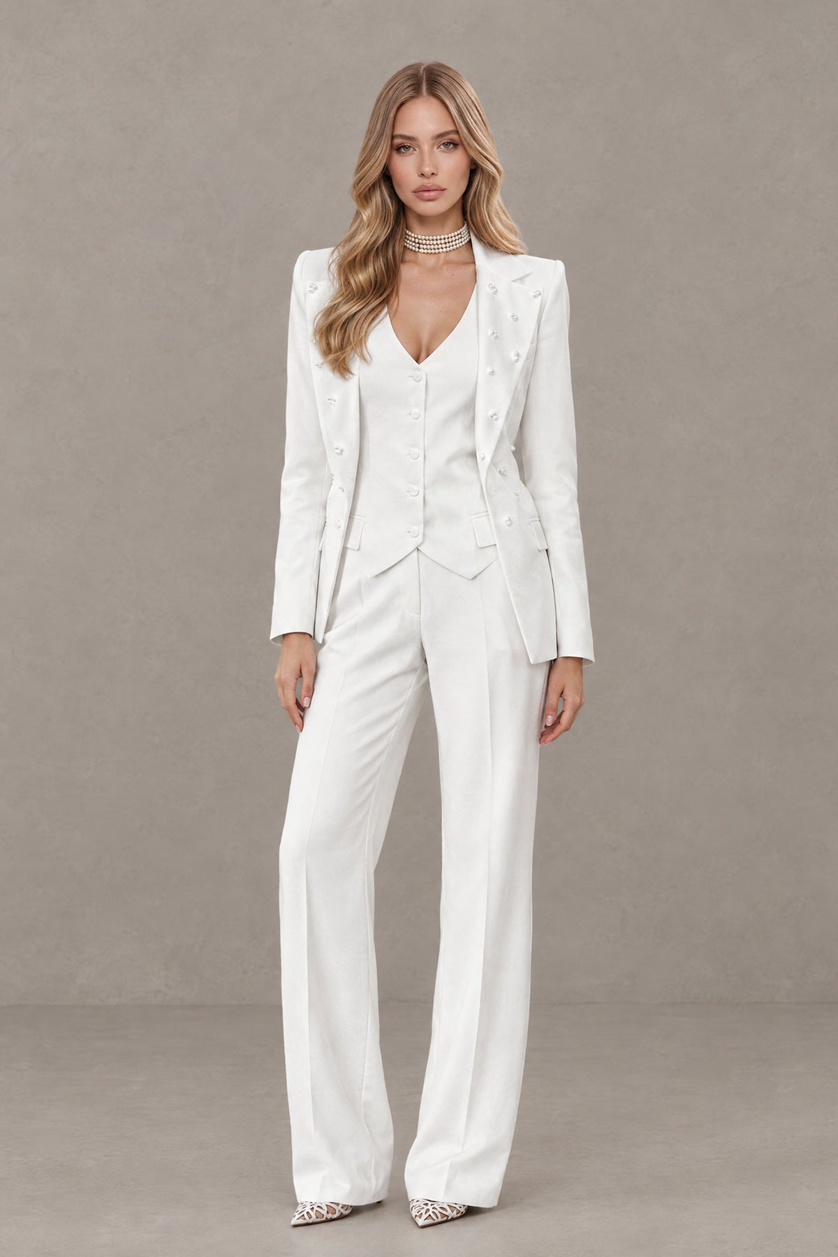 BOLODOO white three-piece pantsuit showing long-sleeve blazer and button-front vest