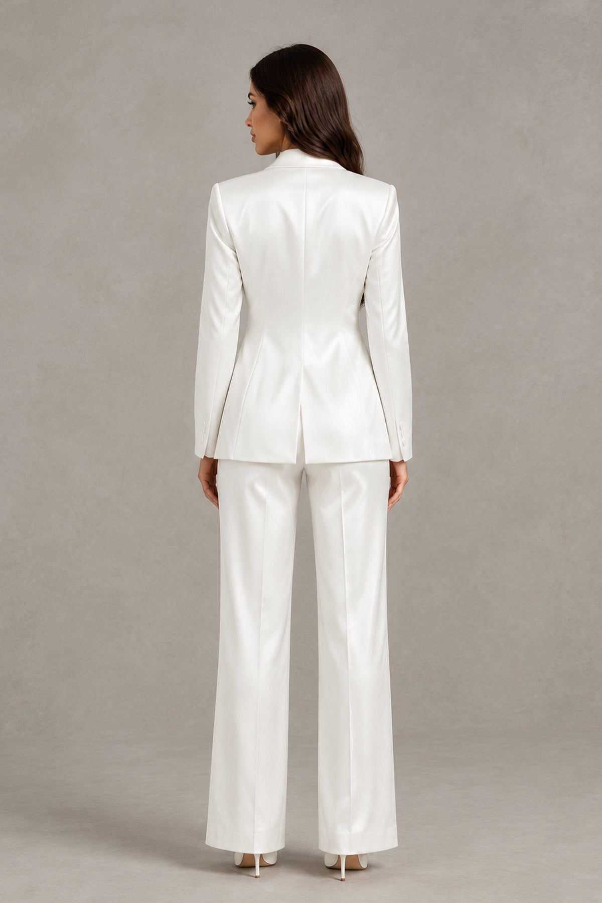 BOLODOO QQ092 white bridal pantsuit showing covered back and blazer vent, rear view