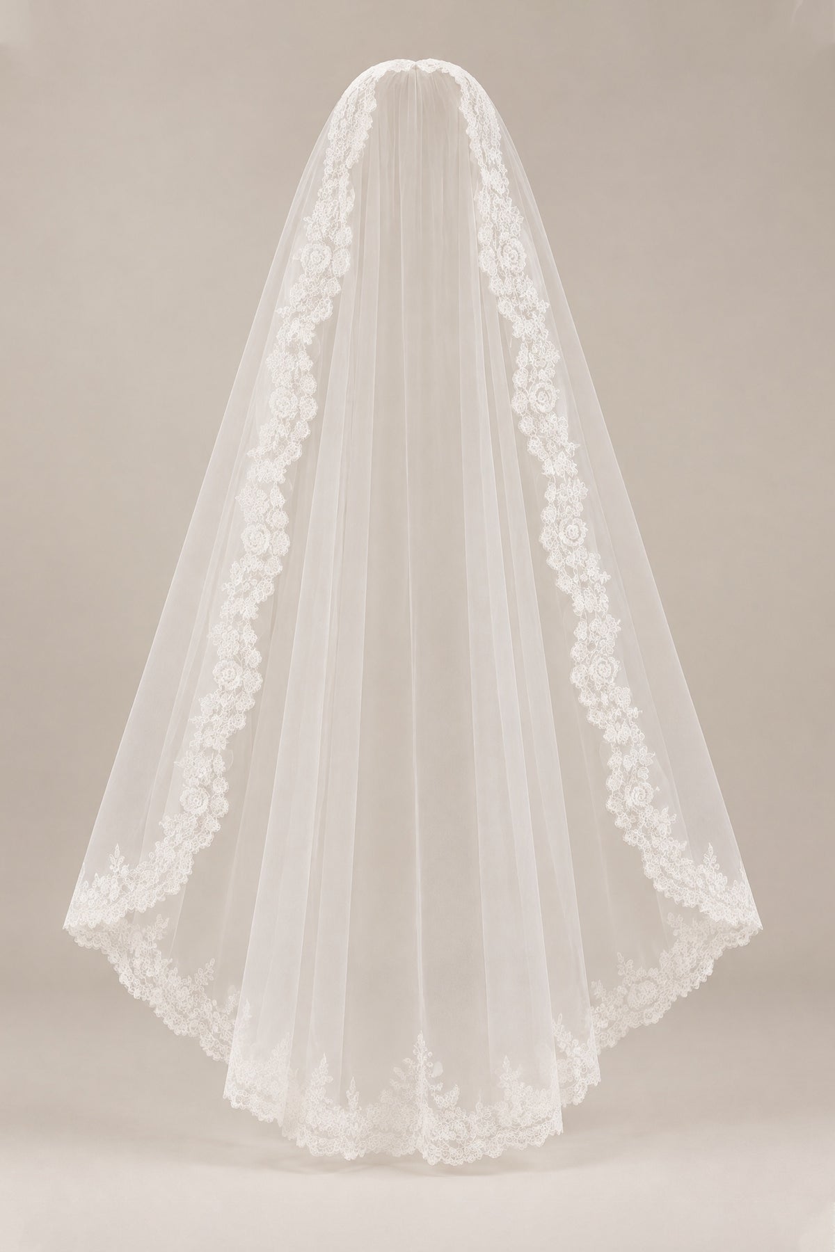 White tulle wedding veil QQ083 showing its full curved shape and floral lace border