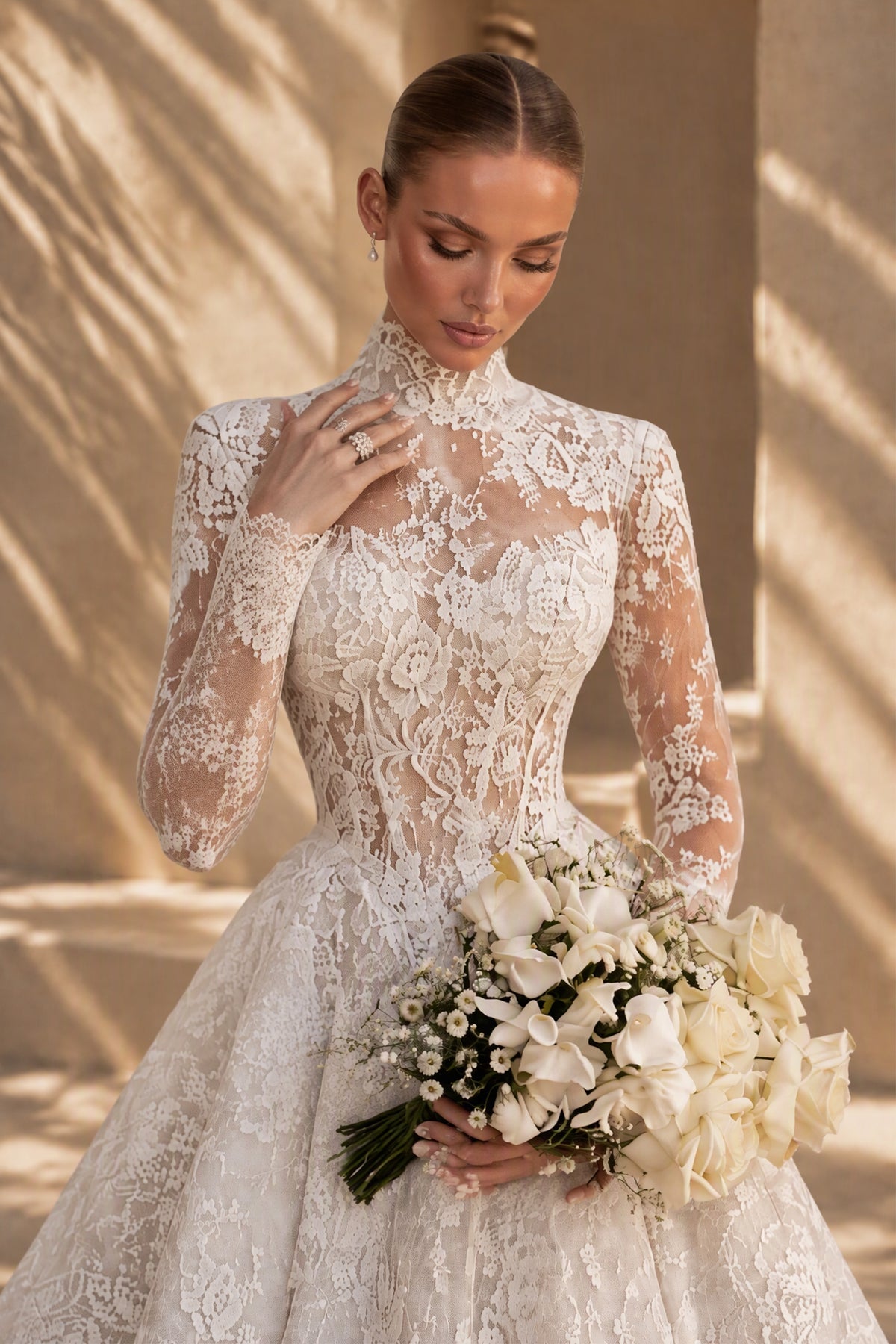 BOLODOO XX051 wedding gown, close-up of high illusion neckline and sheer long lace sleeves
