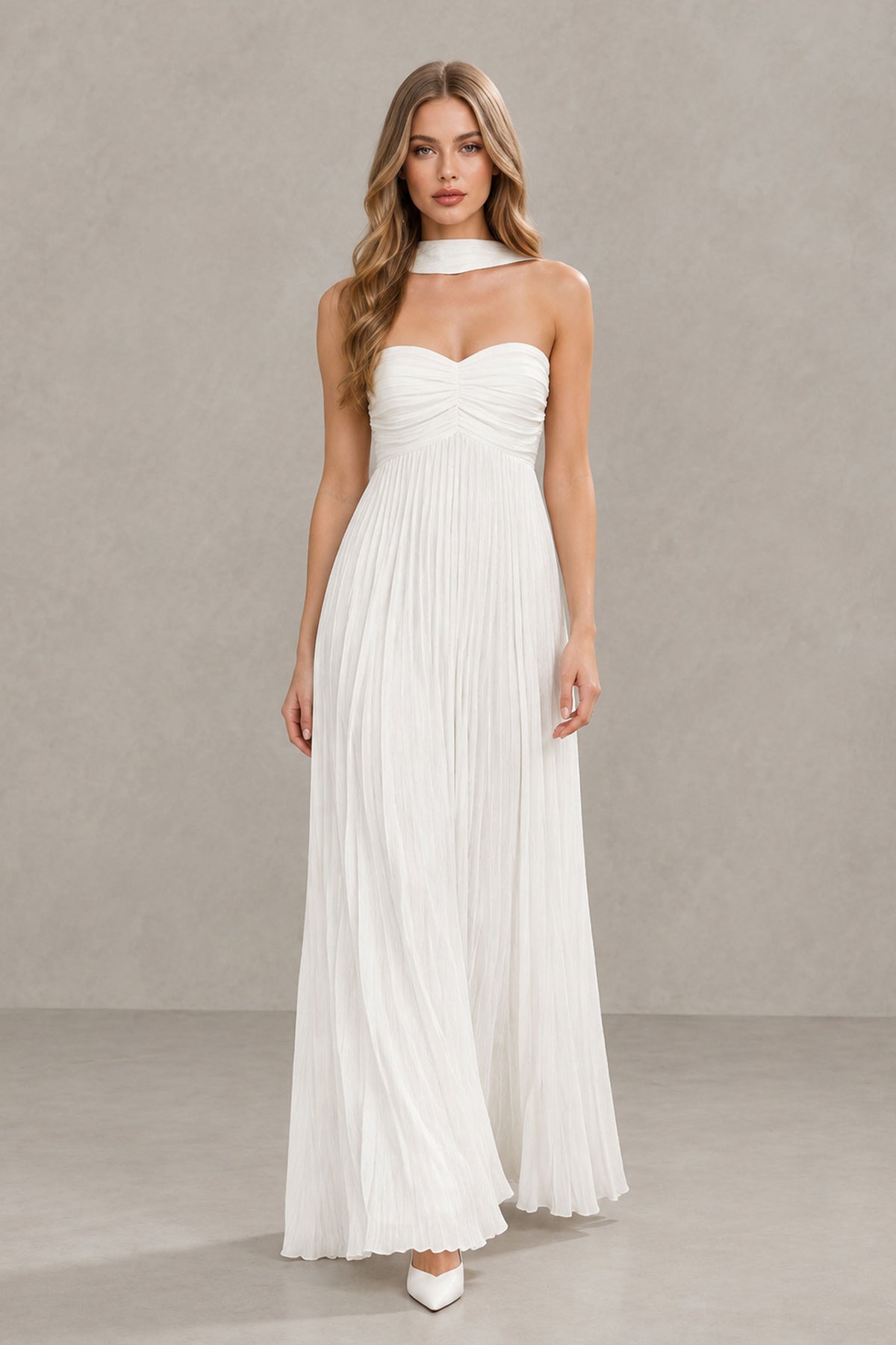 White pleated floor-length wedding dress with ruched sweetheart bodice and neck scarf