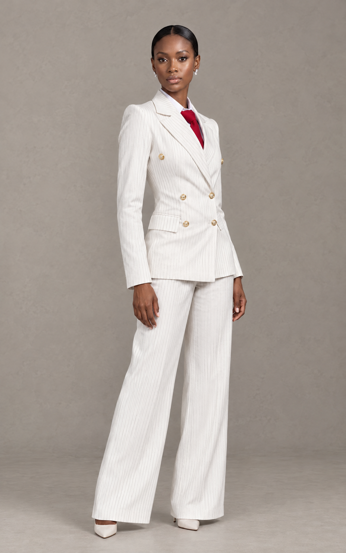 BOLODOO QQ068 white women's pantsuit angled view showing gold-tone buttons and tailored waist