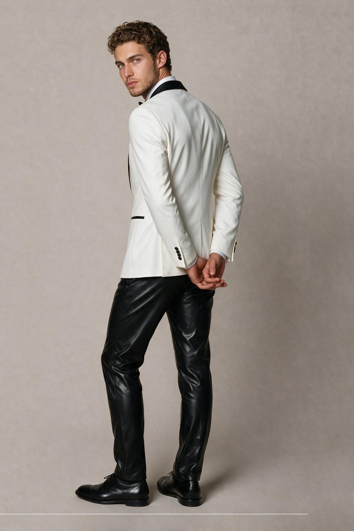 BOLODOO Men's Ivory Tuxedo Blazer FQ0035 - front half-body close-up showing black shawl lapel, single button and black contrast piping pocket detail