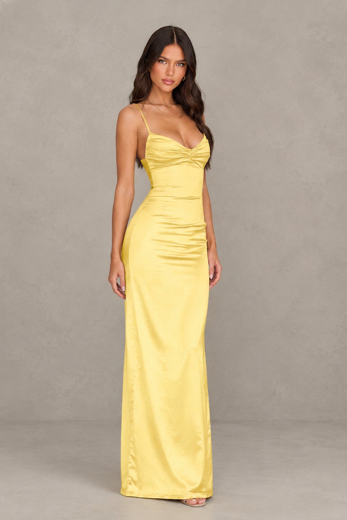 BOLODOO yellow satin maxi dress side slit front angle view