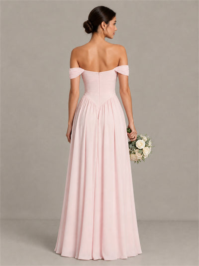 Blush pink chiffon bridesmaid gown with open back and zipper back view