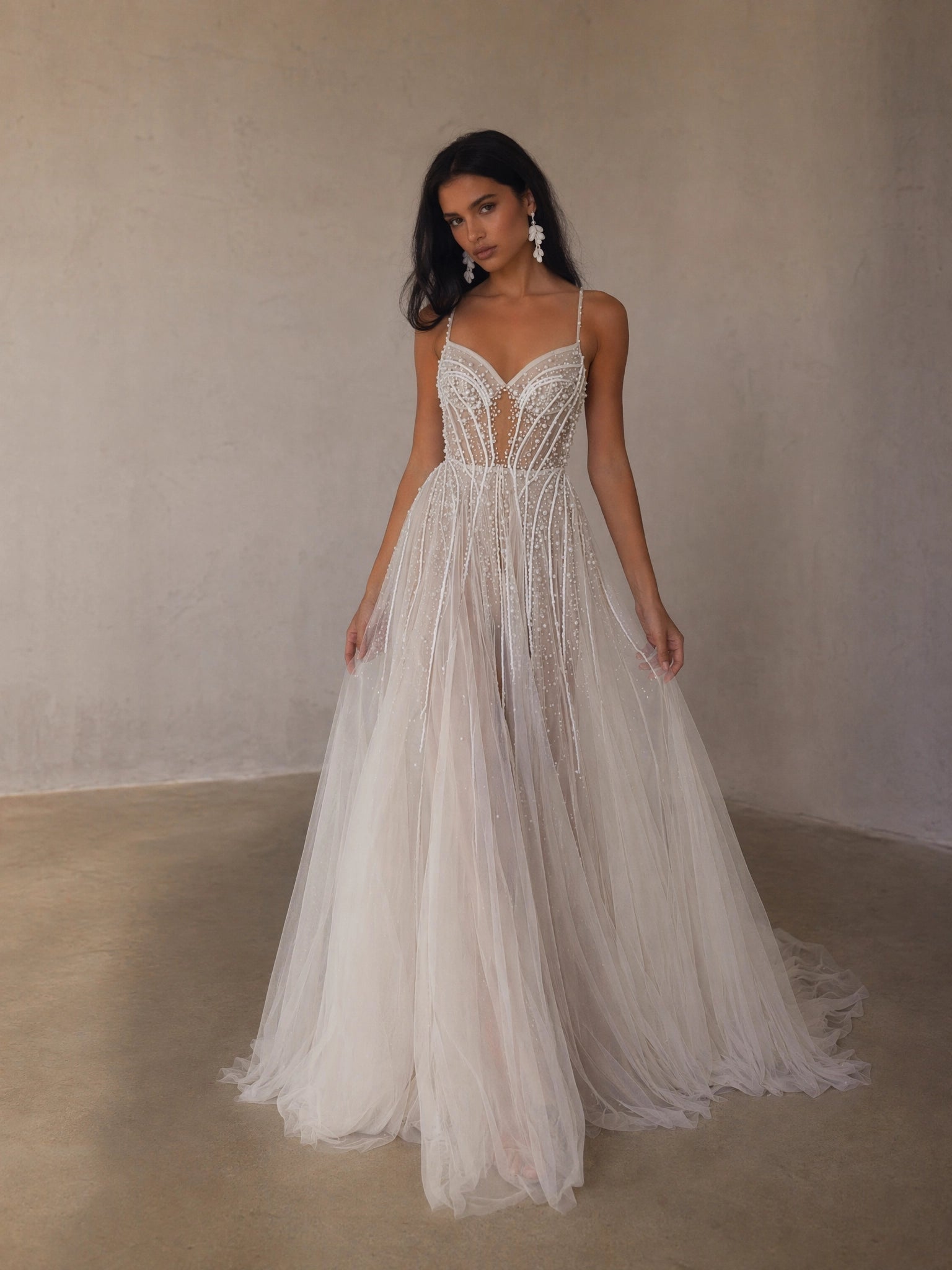 BOLODOO Ivory Spaghetti Strap Sweetheart All-Over Pearl Crystal Beaded Sheer Boned Corset A-Line Tulle Wedding Gown - front view 2 with feather-edge train