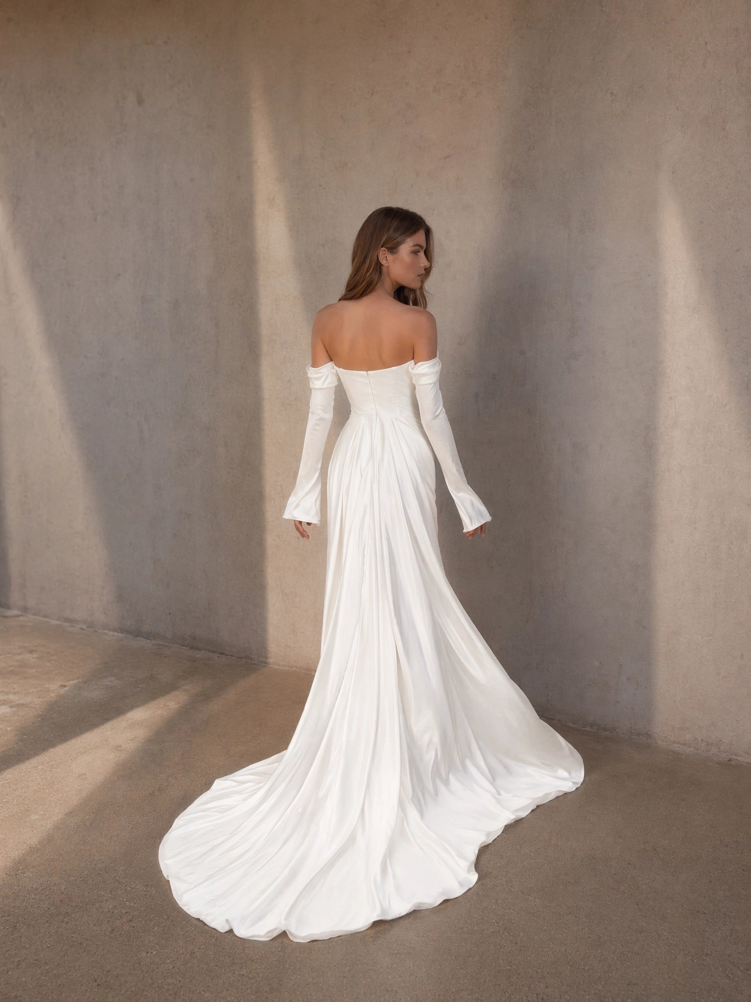 BOLODOO White Strapless Straight Neck Satin A-Line Wedding Gown - back view open back with off-shoulder bell sleeves and sweeping cathedral train