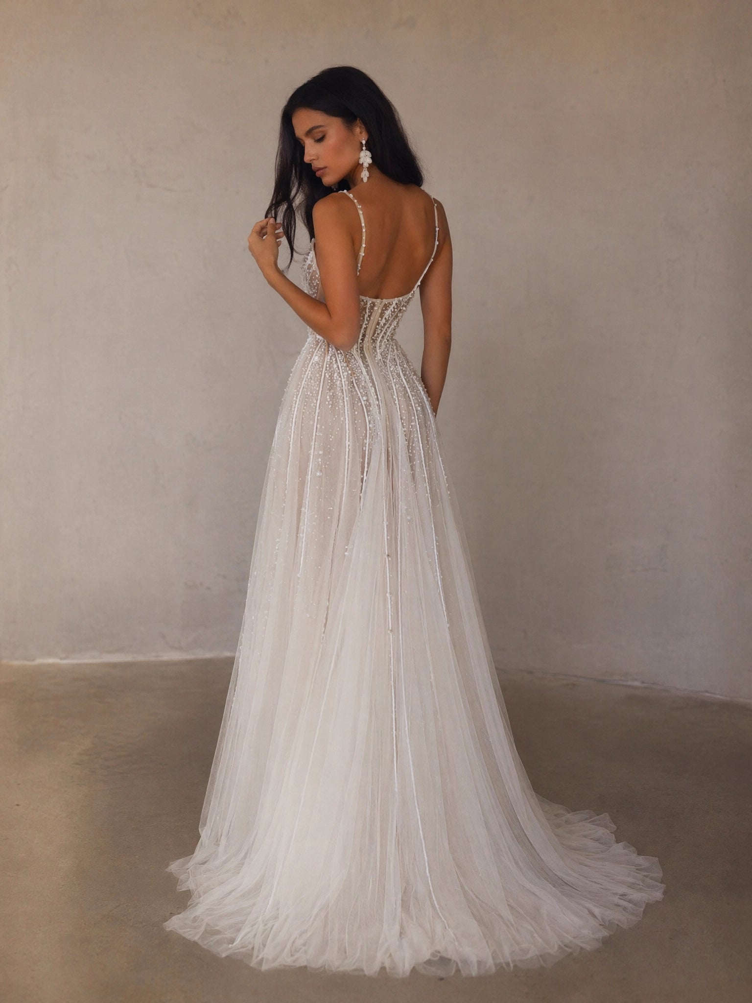 BOLODOO Ivory Spaghetti Strap Sweetheart All-Over Pearl Crystal Beaded Sheer Boned Corset A-Line Tulle Wedding Gown - back view low open back with pearl cross-back straps and feather-edge train