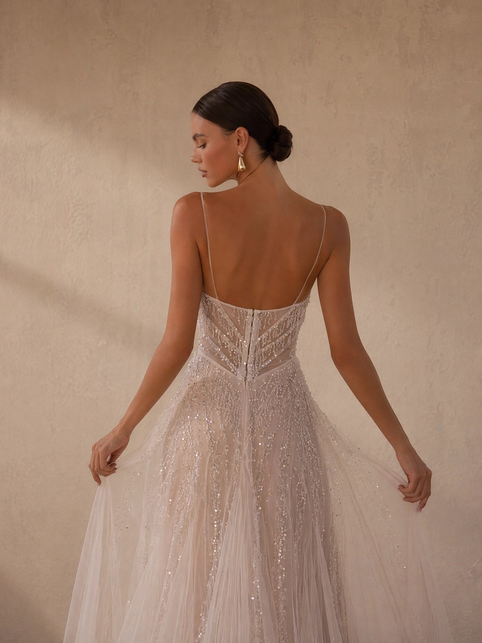 BOLODOO Ivory Spaghetti Strap Sweetheart All-Over Sequin Crystal Beaded Sheer Boned Corset A-Line Tulle Wedding Gown - back view low open back with spaghetti strap cross-back and feather-edge train