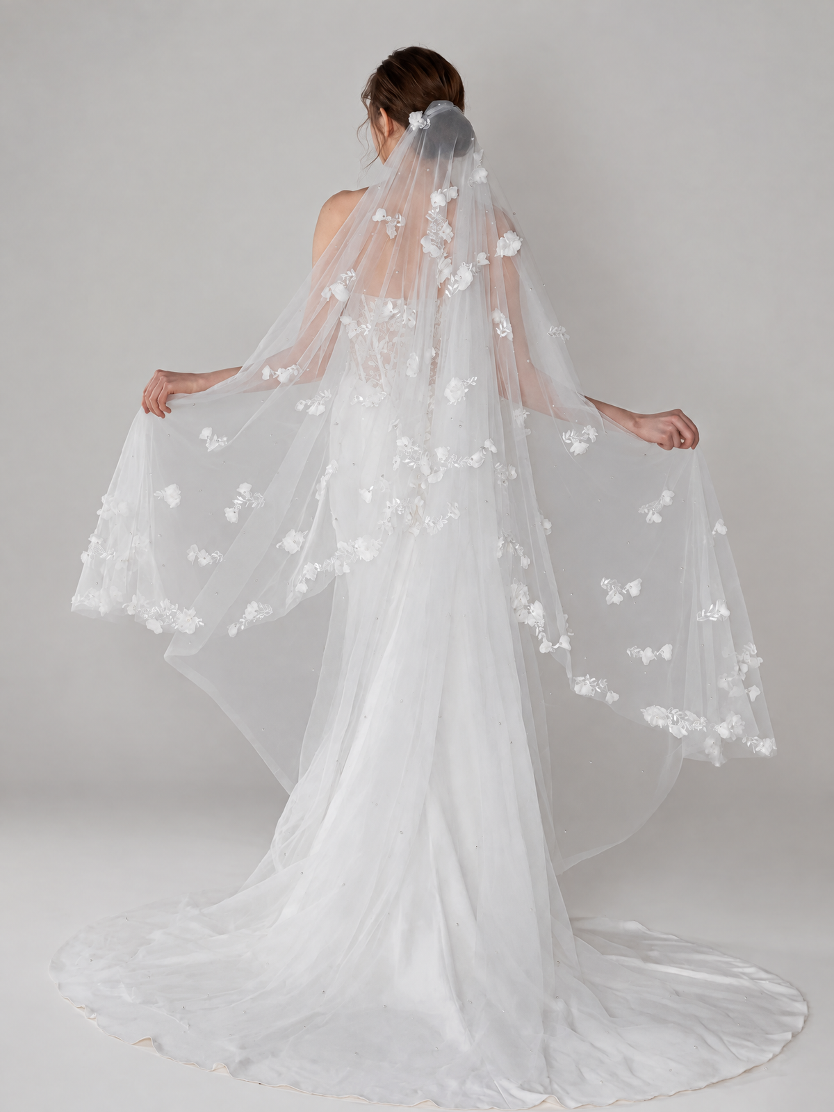 BOLODOO white floral veil on a mannequin showing embroidered botanical details