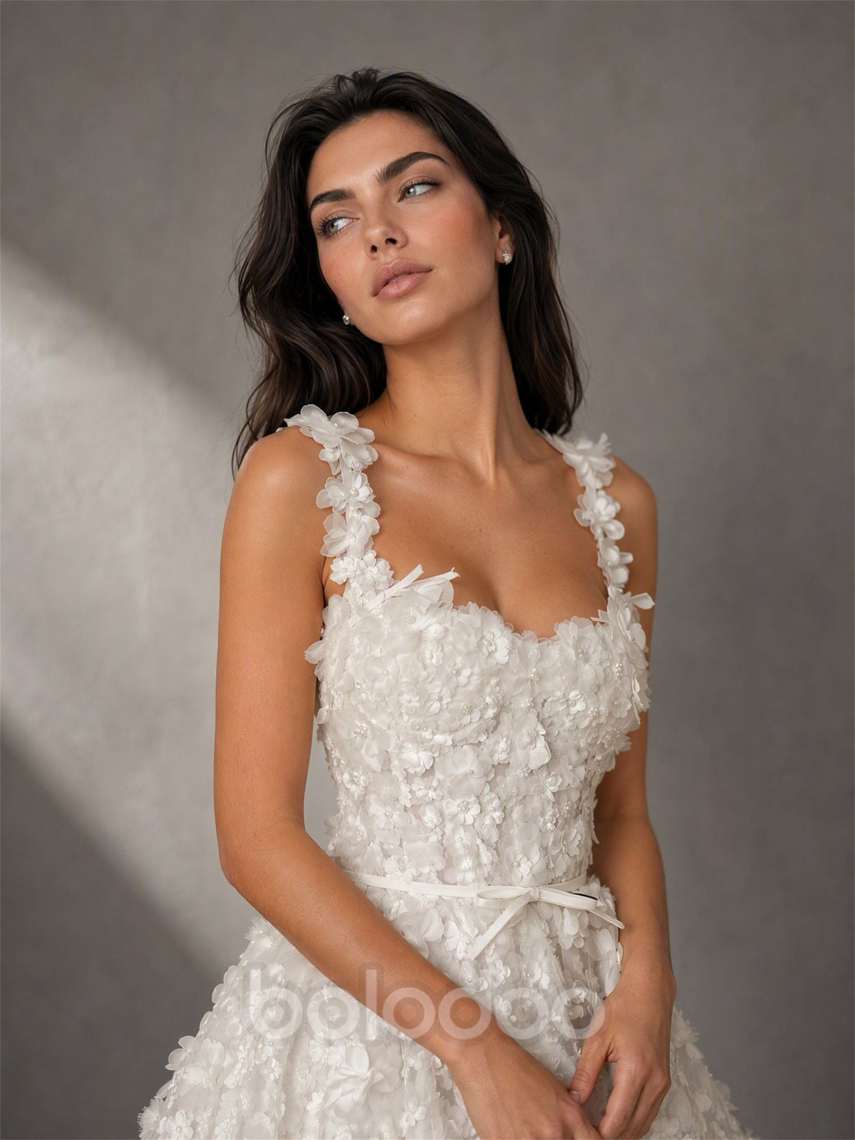 BOLODOO BD0565 white 3D floral appliqué sweetheart mini dress - close-up of bodice showing floral detail and satin ribbon bow belt | BOLODOO watermark