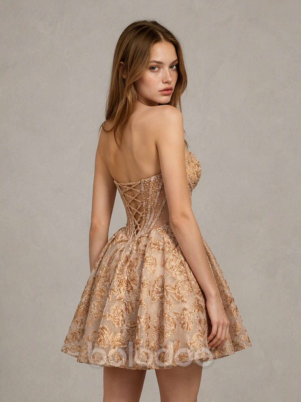 BOLODOO BD0570 champagne gold floral jacquard pearl corset strapless mini dress - front three-quarter view showing crystal sweetheart neckline and sheer boned corset bodice | BOLODOO watermark