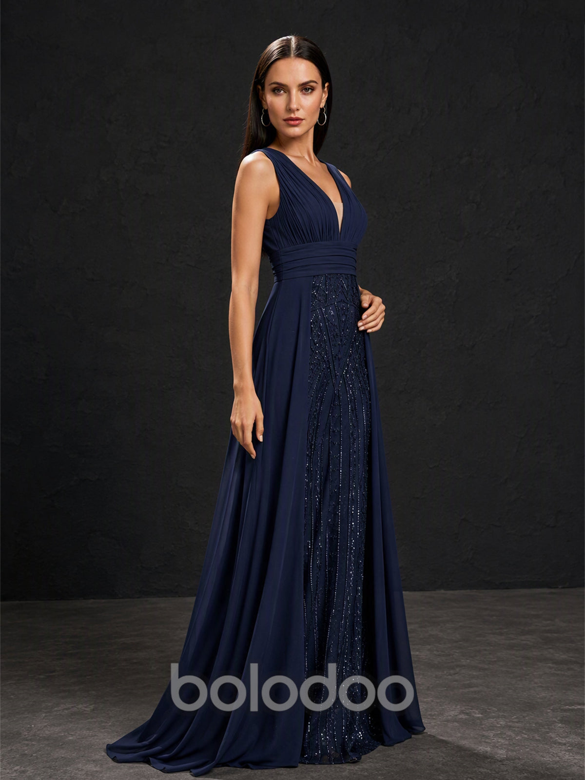 BOLODOO BX0003 navy blue chiffon gown - back view showing illusion beaded back yoke and flowing A-line skirt | BOLODOO watermark