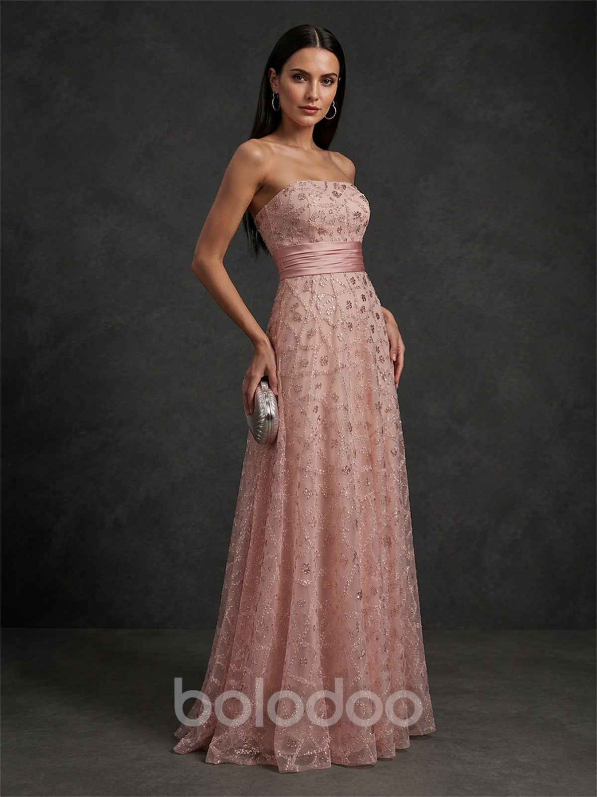 BOLODOO BX0005 blush pink strapless gown - three-quarter front view showing sweetheart neckline and glitter floral embroidery on tulle skirt | BOLODOO watermark