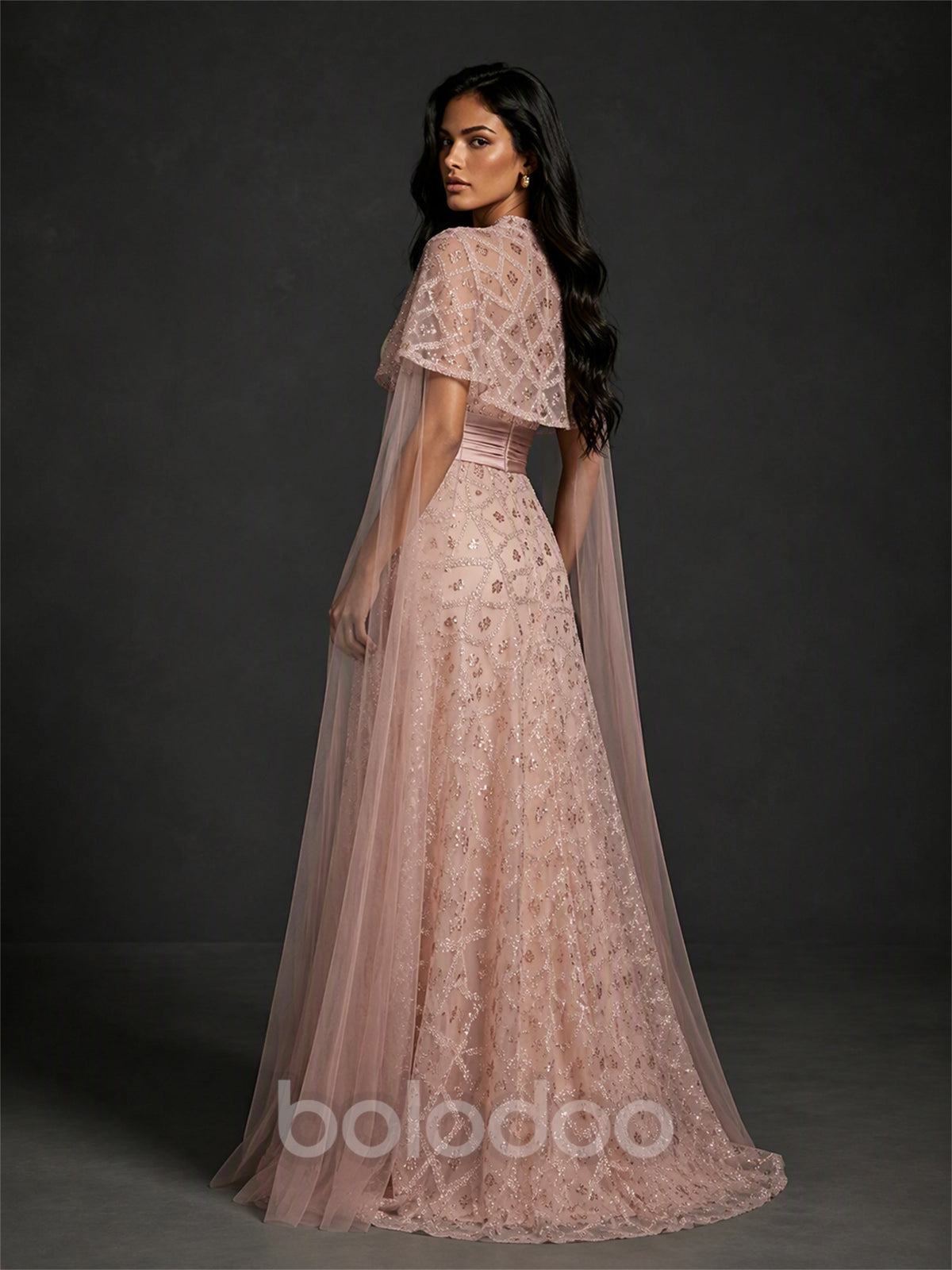 BOLODOO BX0005 blush pink cape gown - back view showing dramatic trailing tulle cape and glitter embroidered skirt | BOLODOO watermark
