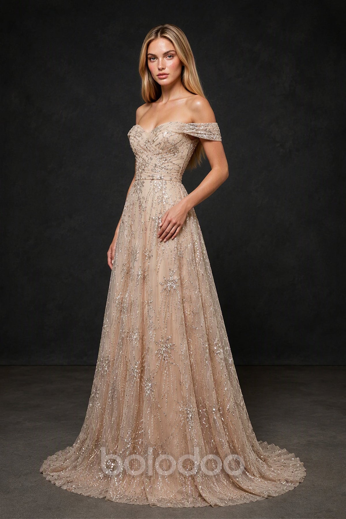 BOLODOO BX0019 champagne rose gold glitter tulle gown - side view showing off-shoulder silhouette, defined waistband and full A-line starlight sequin tulle skirt with chapel train | BOLODOO watermark