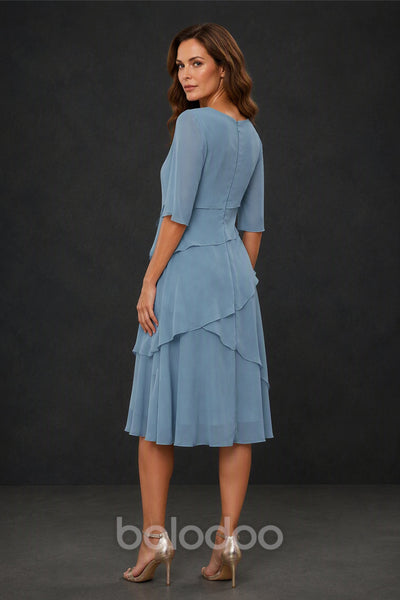 BOLODOO Dusty Blue Chiffon 3/4 Sleeve Asymmetric Tiered Tea Length Dress - Front Three Quarter View | BOLODOO watermark