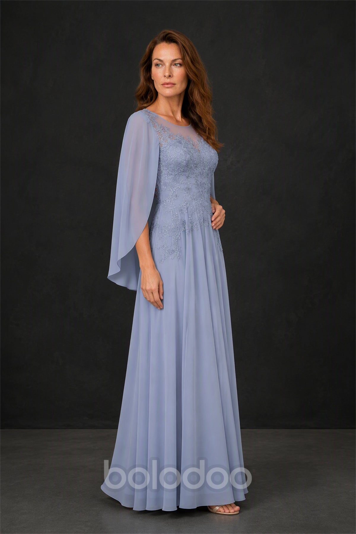 BOLODOO Cornflower Blue Illusion Lace Cape Sleeve Beaded Chiffon Gown - Front Walking View with Clutch | BOLODOO watermark