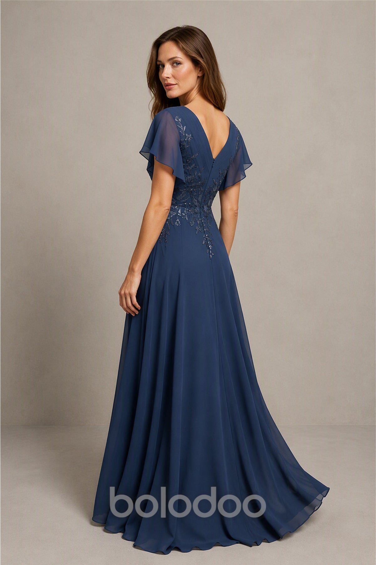 BOLODOO Steel Blue Flutter Sleeve Sequin Embroidery Chiffon A-Line Gown - Back View Showing Open V-Back | BOLODOO watermark