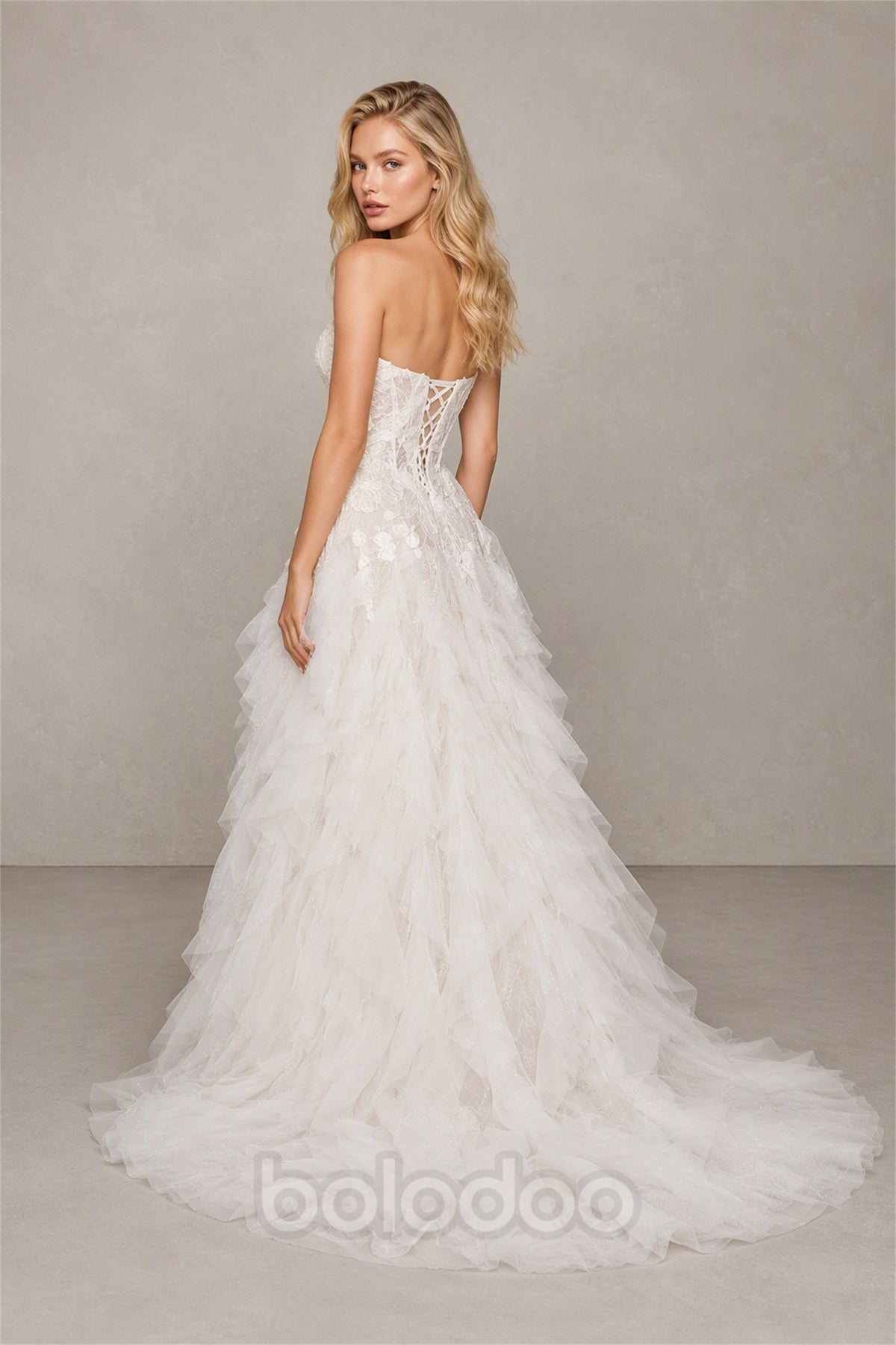 BOLODOO BX0059 white 3D floral lace strapless sweetheart tiered ruffle tulle A-line wedding gown - full length front view with cathedral train | BOLODOO watermark