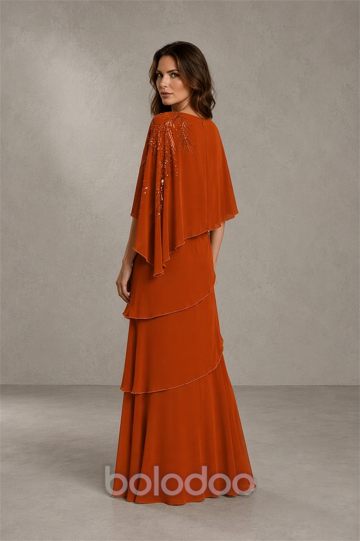 BOLODOO Burnt Orange Mocha Asymmetric Cape Sleeve Burnt Orange Sequin Embroidered Pearl Trim Tiered Chiffon Gown - Burnt Orange | BOLODOO watermark