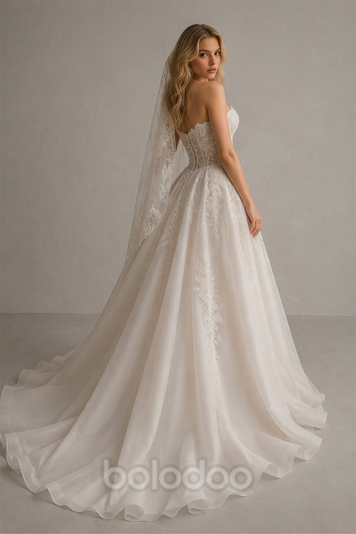 BOLODOO Ivory Lace Strapless Sweetheart A-Line Wedding Ball Gown - Front View Standing | BOLODOO watermark