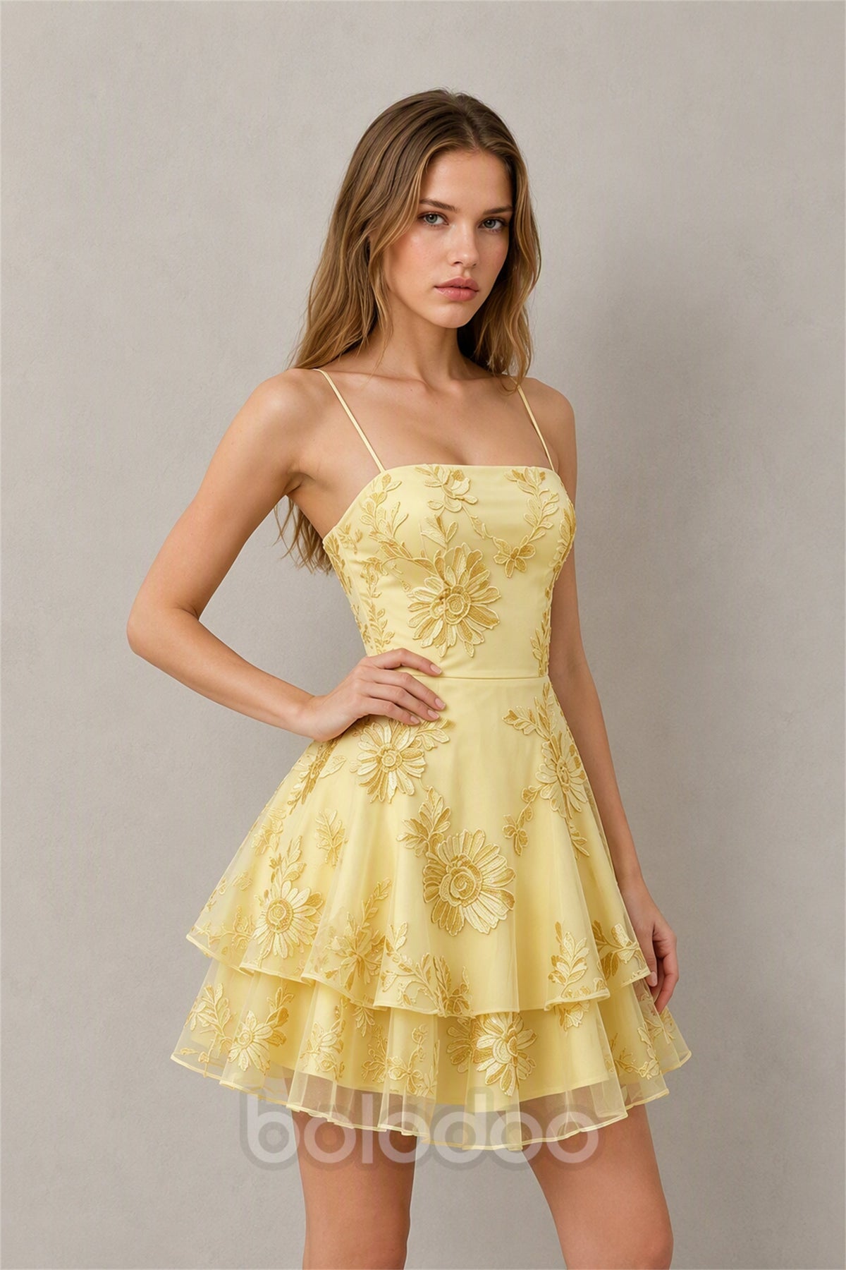 BOLODOO Yellow Embroidered Floral Spaghetti Strap Square Neck Lace-Up Back Tiered Ruffle Mini Dress - Three-Quarter Front View | BOLODOO watermark