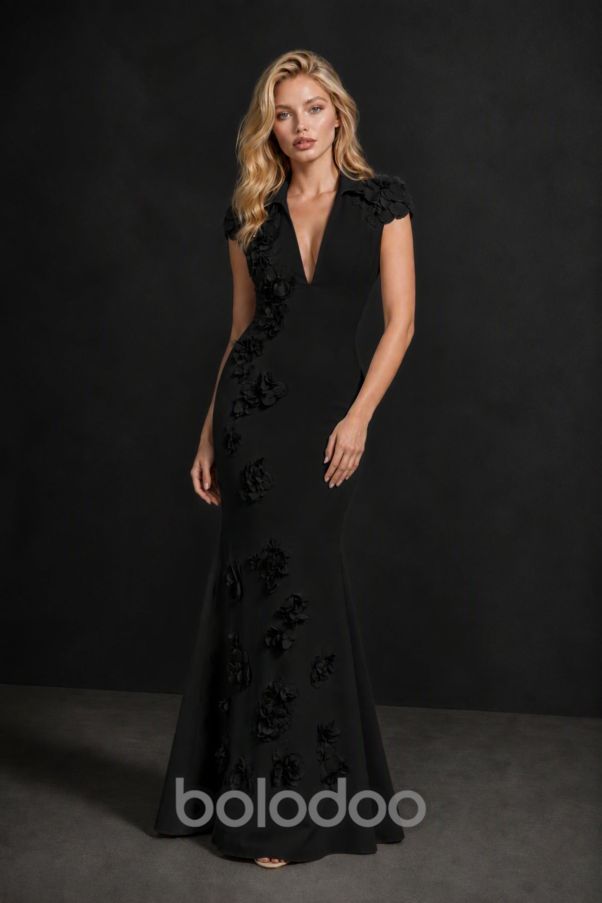 BOLODOO Black 3D Floral Appliqué Mermaid Gown - Back View Showing Covered Back and Flared Hem | BOLODOO watermark