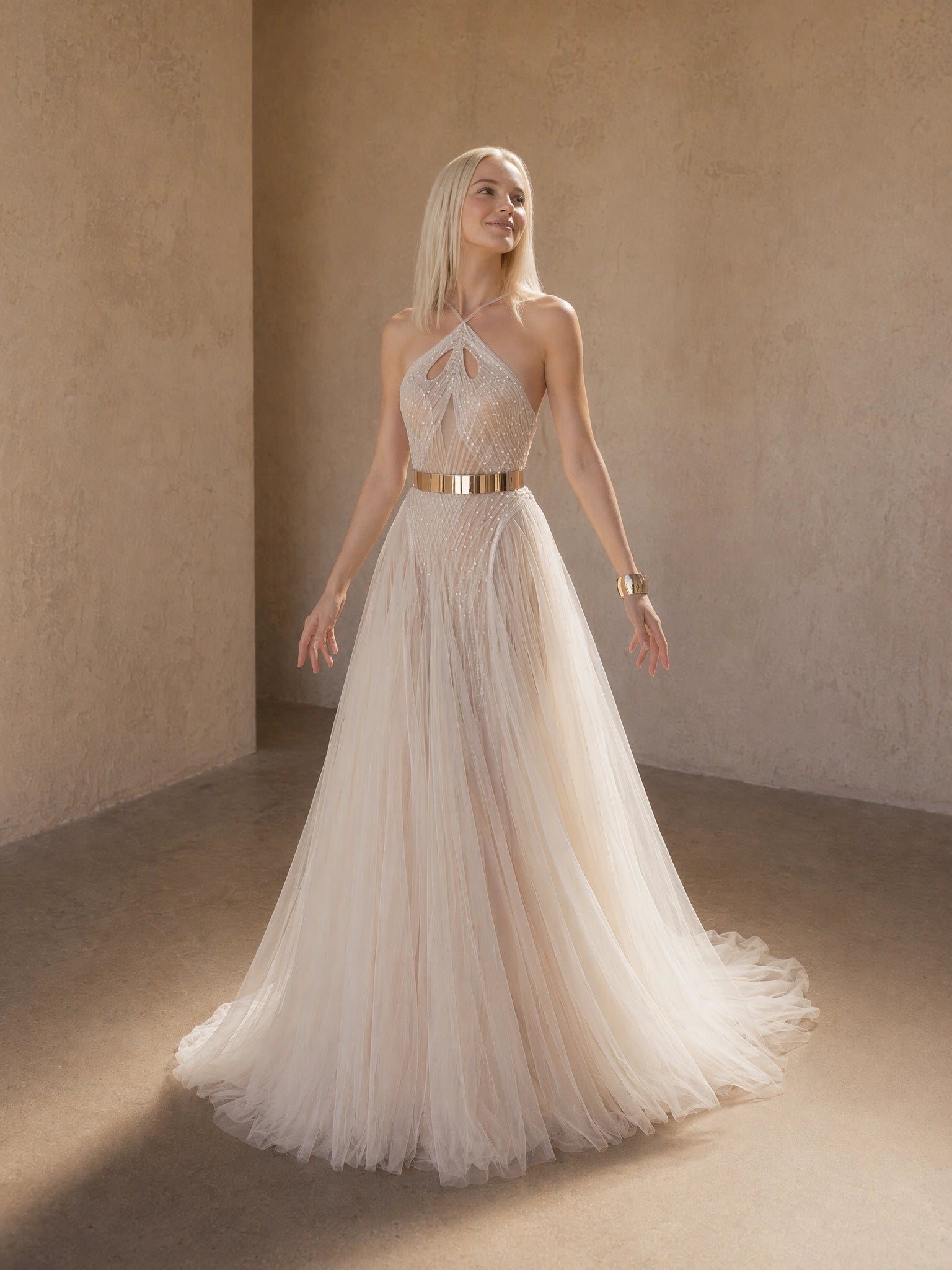 BOLODOO Champagne Halter Neck Crossover Keyhole Crystal Beaded Sheer Tulle A-Line Wedding Gown - front view 2 with sweeping train and gold belt