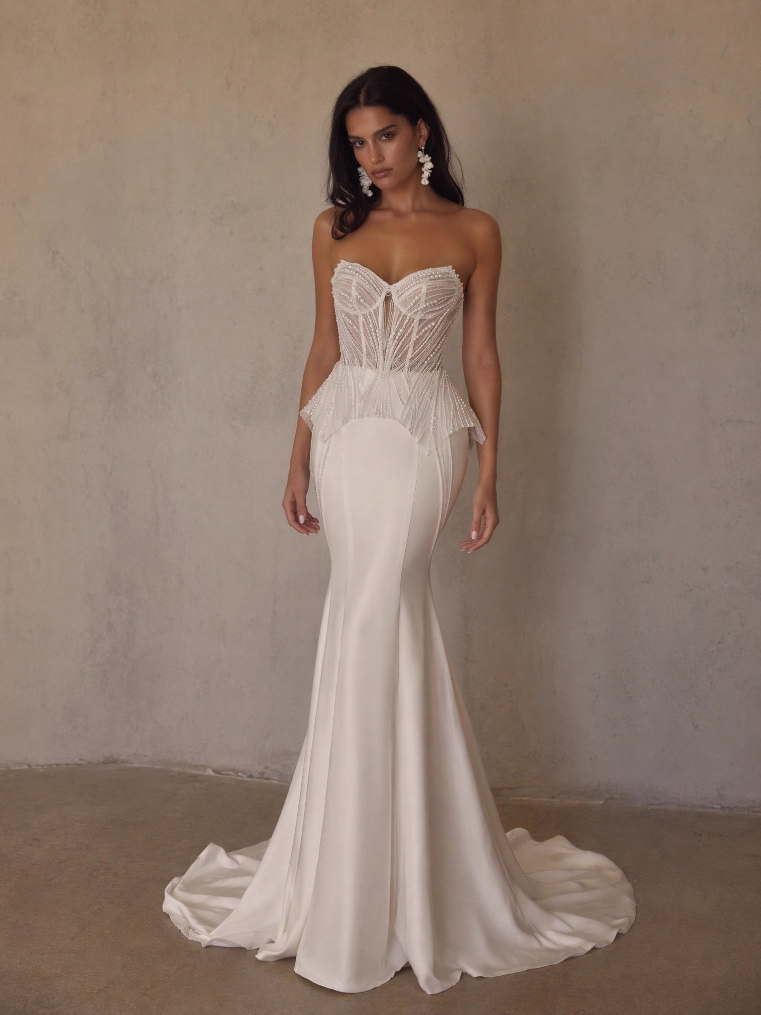 BOLODOO White Radiating Crystal Beaded Sheer Boned Corset Feather Peplum Satin Mermaid Wedding Gown - full front view with feather peplum