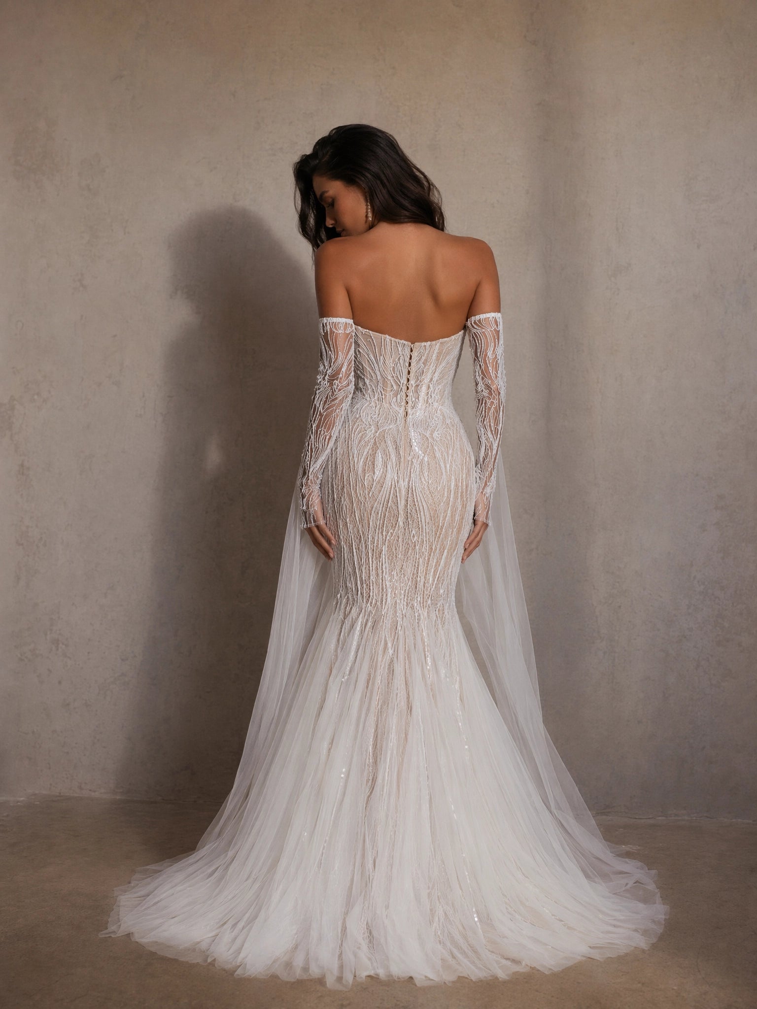 BOLODOO Ivory Branch Crystal Beaded Sheer Mermaid Wedding Gown - back view open back with beaded glove sleeves and tulle train